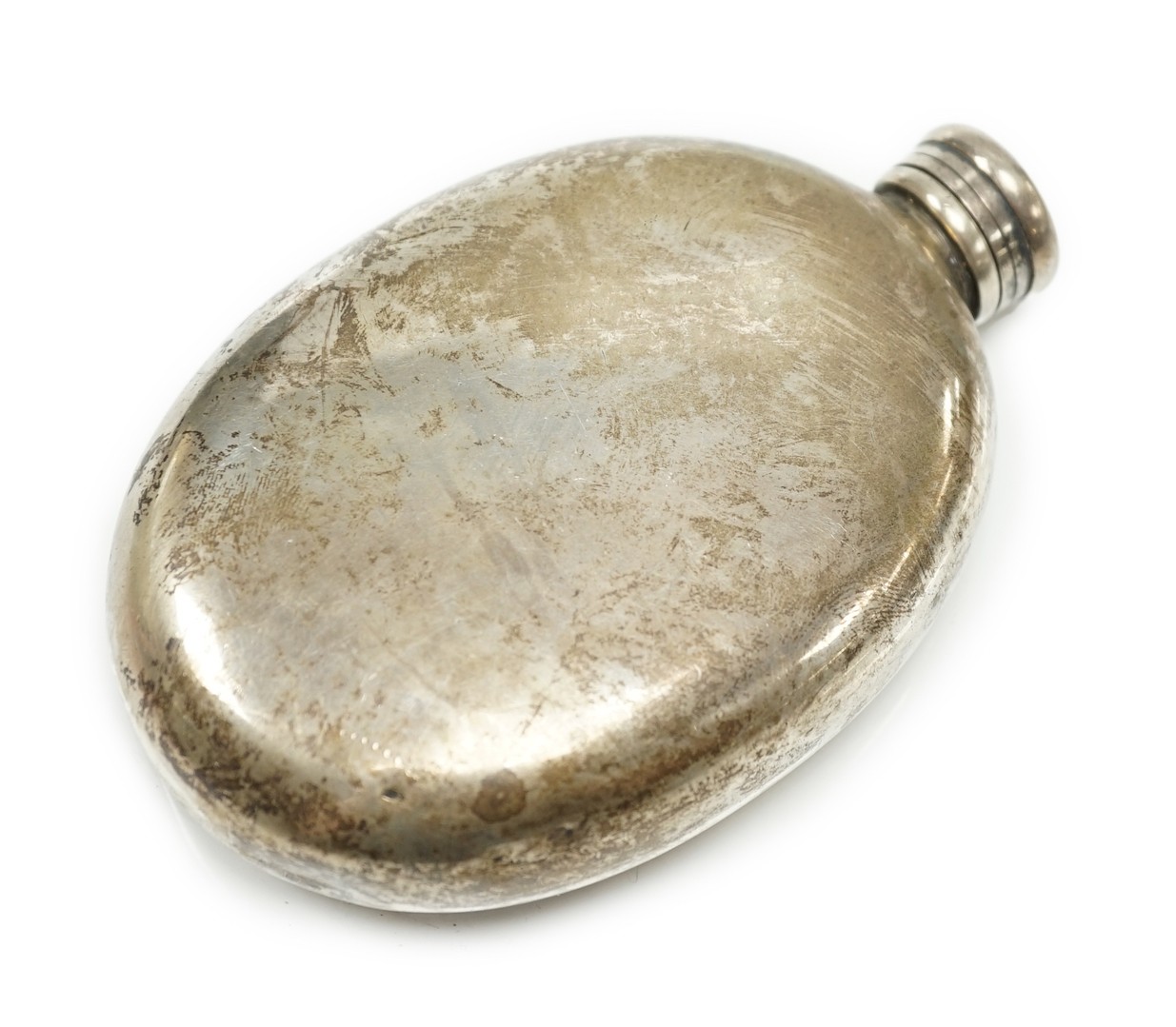A Victorian silver oval hip flask, Fenton Brothers, Sheffield, 1874, 12.5cm, 6.3oz.